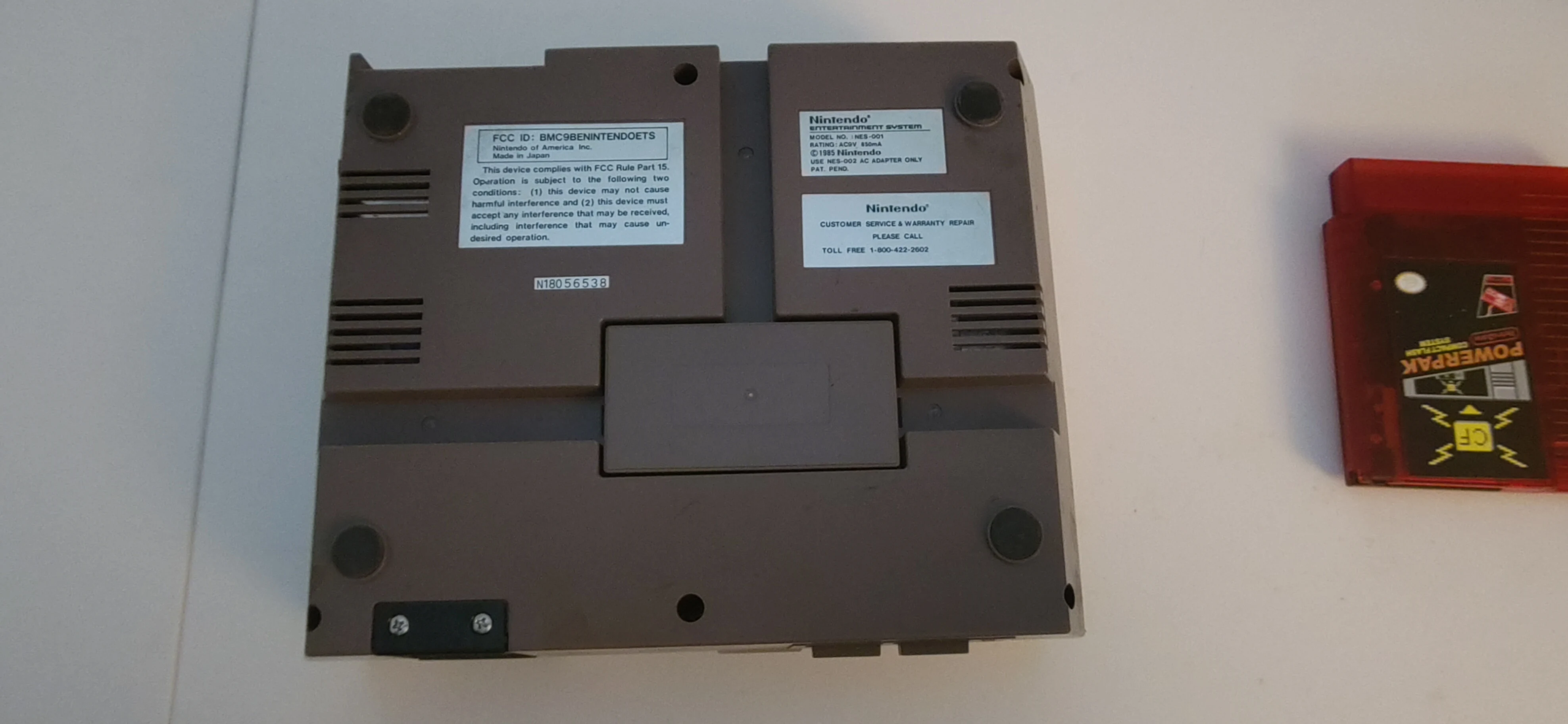 Remove the screws under the console