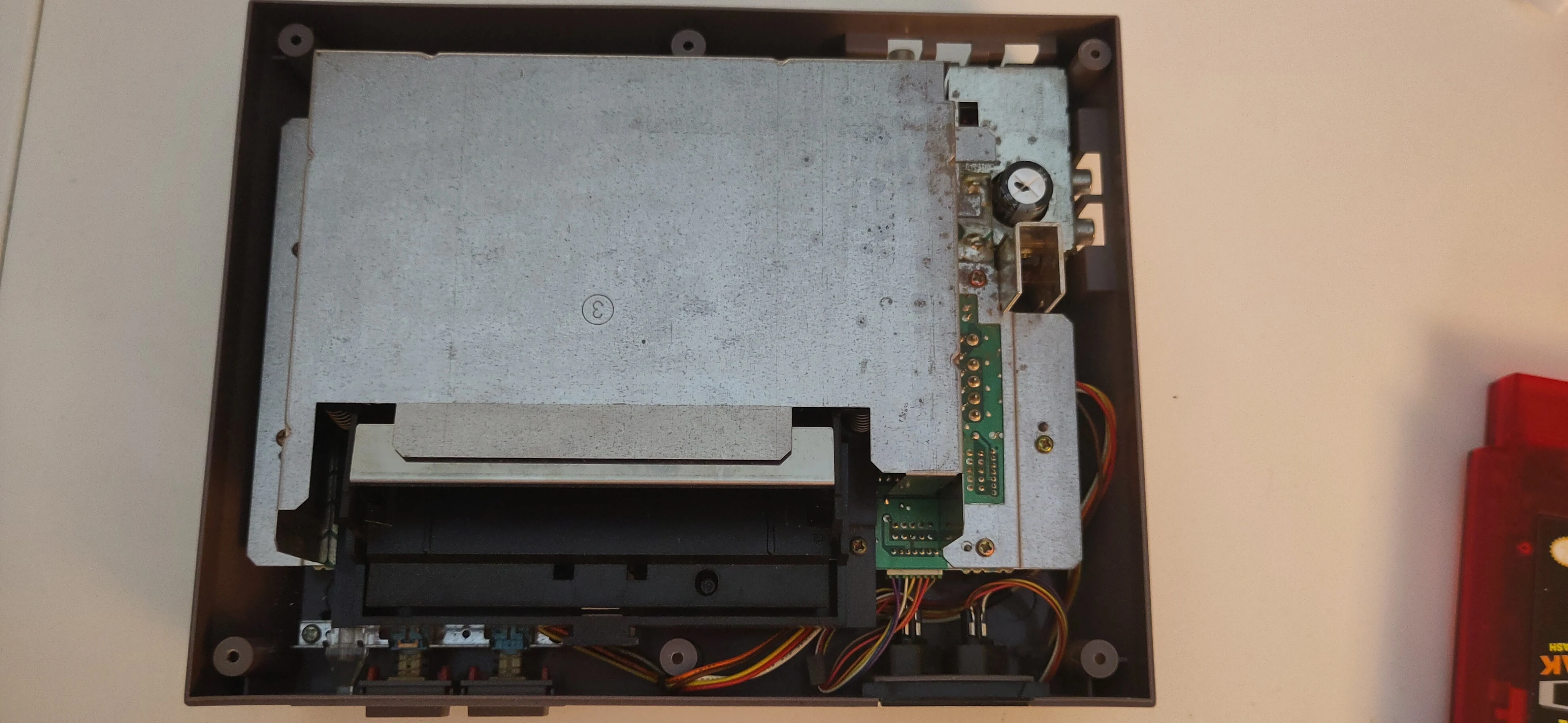 Remove RF shield screws